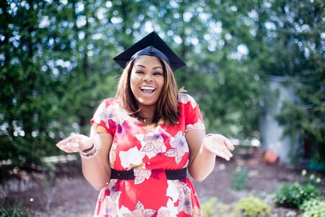 How to Easily Lower Student Loan Interest 1 happy graduate girl