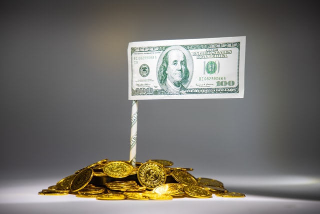 gold coins and flag made of money