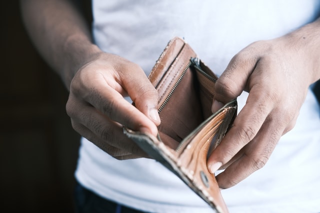 High Earner Not Rich Yet: How to Avoid Becoming a HENRY 2 holding empty wallet