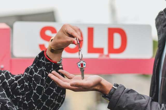 giving a key to a sold house