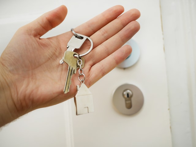 holding keys to a house