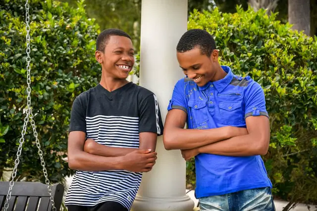 The Best Debit Cards for Kids to Teach Them About Money 2 Two smiling boys