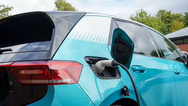 Redwood Materials Stocks 3 charging electric car